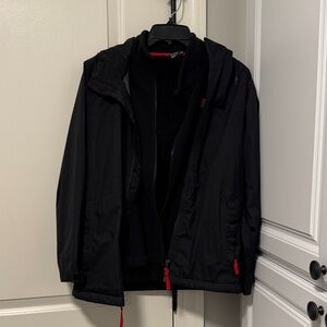 The North Face Boys 2 piece rain jacket with fleece under liner.